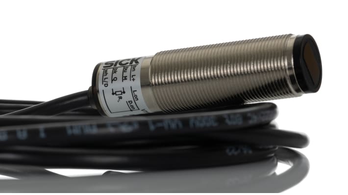 Sensore fotoelettrico cilindrico Sick VTF18-4N1212, rilevamento da 3 mm a 100 mm, uscita NPN, IP67, custodia in metallo.