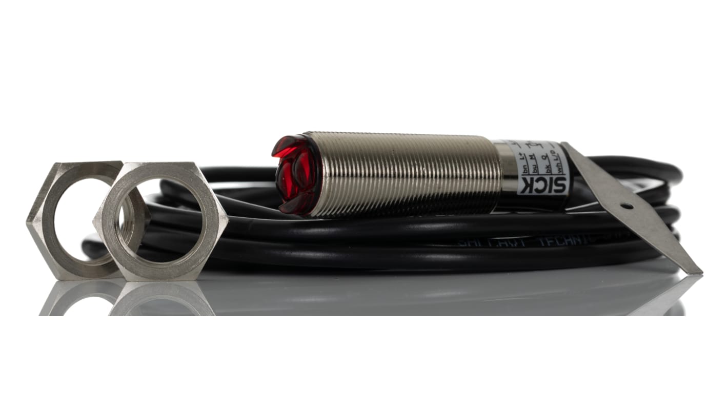 Sensore fotoelettrico cilindrico Sick VTB18-4P1212, rilevamento 25-140 mm, montaggio a pannello, grado di protezione IP67.