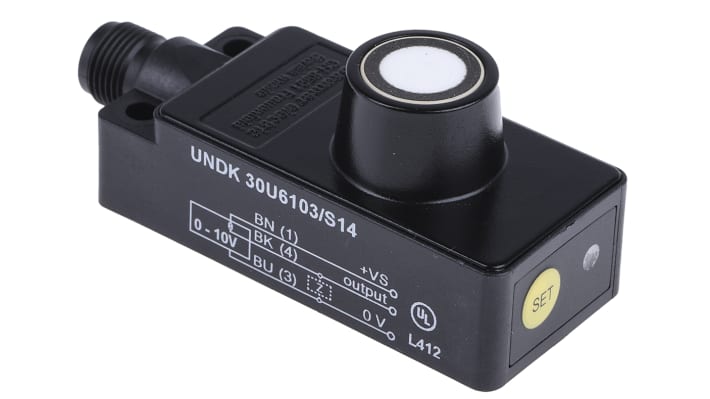 Baumer UNDK 30U6103/S14, sensore di prossimità parallelepipedo, rilevamento 100-1000 mm, alimentazione 15-30 V c.c., IP67. Dimensioni 65 x 30 x 31 mm.