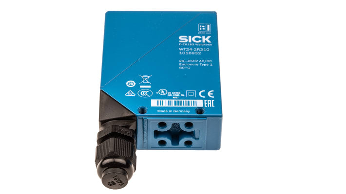 Sensore fotoelettrico Sick WT24-2R210, uscita relè SPDT, grado di protezione IP69, custodia in zinco, montaggio rotante.