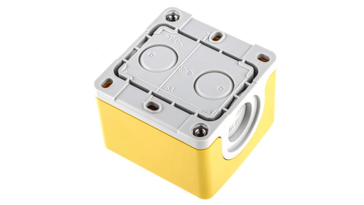Scatola per pulsante ABB, IP66, con foro Ø 22mm, dimensioni 65x65x47.6mm, coperchio giallo, base grigia.