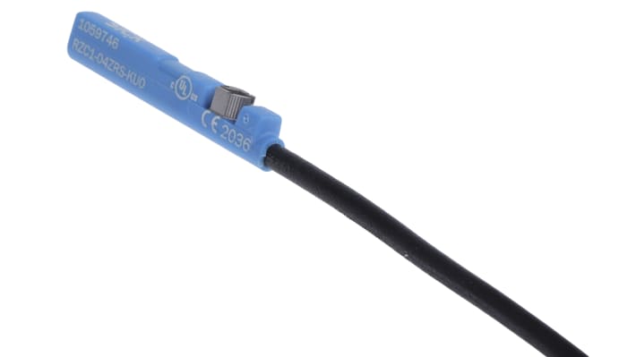 Sensore cilindrico Sick RZC1-04ZRS-KU0, pickup magnetico con protezione IP67, montaggio drop-in, dimensioni 26.3mm x 2.9mm x 4.7mm.