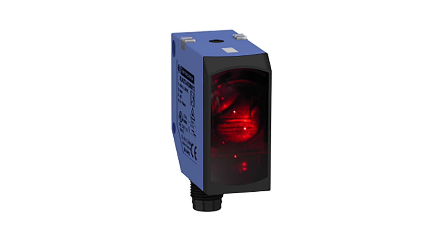 Sensore fotoelettrico Telemecanique Sensors XUK8TAKSMM12, compatto, rilevamento fino a 5 m, con connettore M12, grado di protezione IP67/IP69K. Dimensioni 23 x 50 x 50 mm.