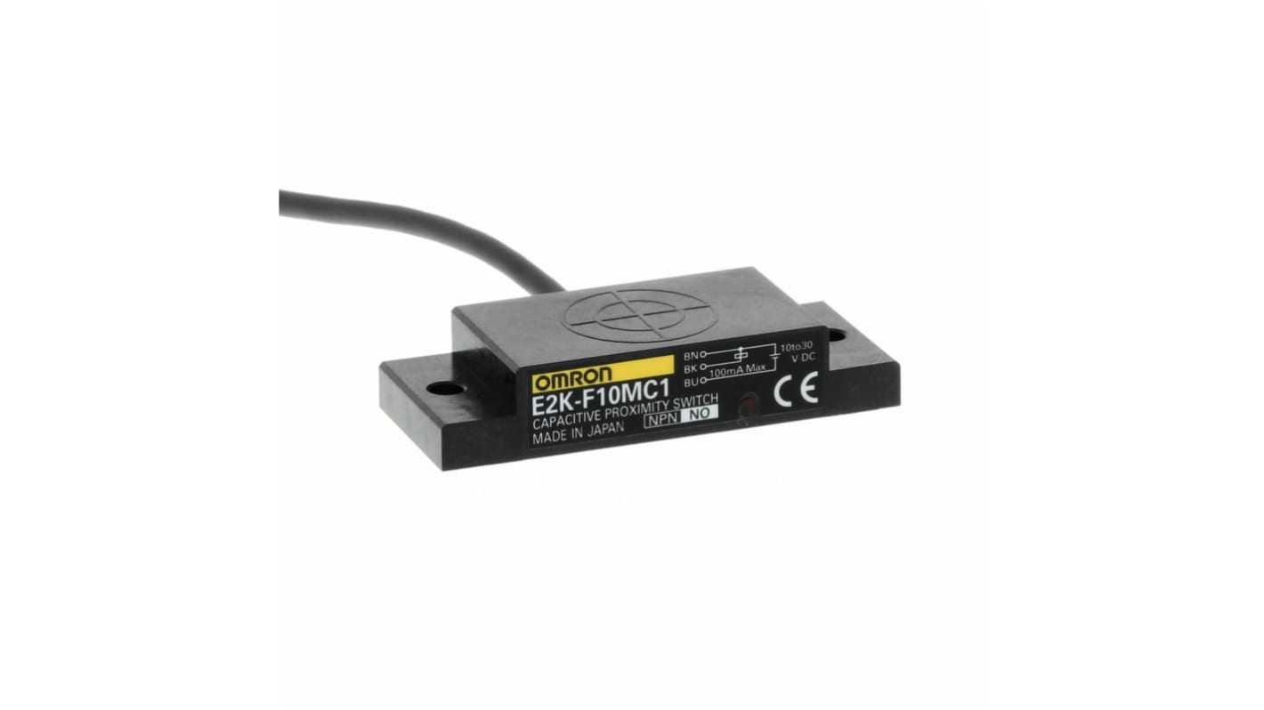 Sensore di prossimità Flat NPN Omron E2K-F10MC1, rilevamento fino a 25 mm, grado di protezione IP65, cavo incluso.