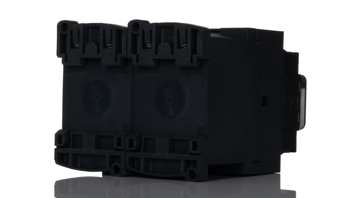 Contattore reversibile Schneider Electric LC2D096BD, 3 poli, 5,5 kW, 24 V c.c., montaggio su guida DIN, dimensioni 77x90x95 mm.