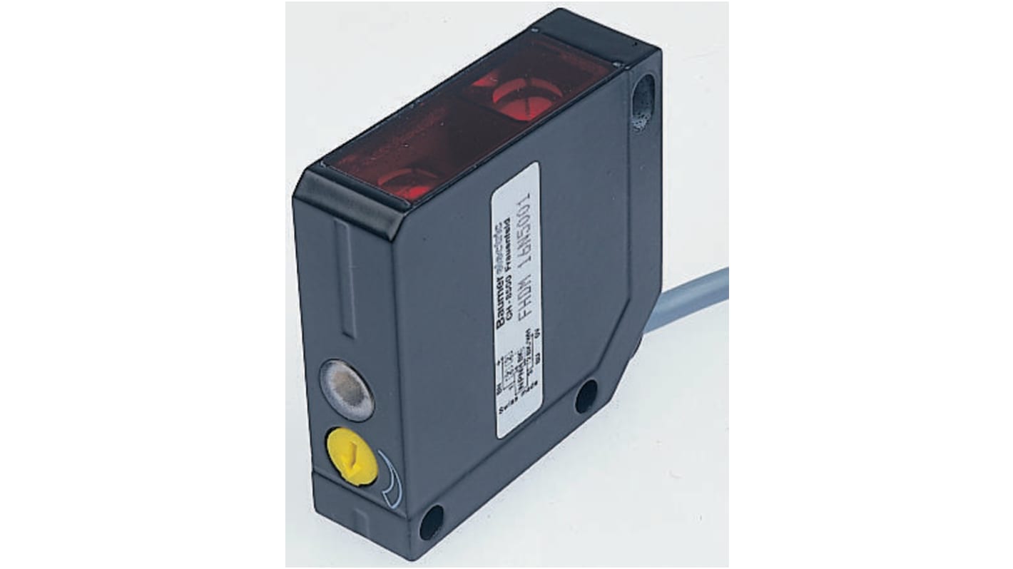 Sensore fotoelettrico rettangolare Baumer FPDM 16P5105, rilevamento fino a 7,3 m, uscita PNP, IP67, temperatura -25°C/+65°C.