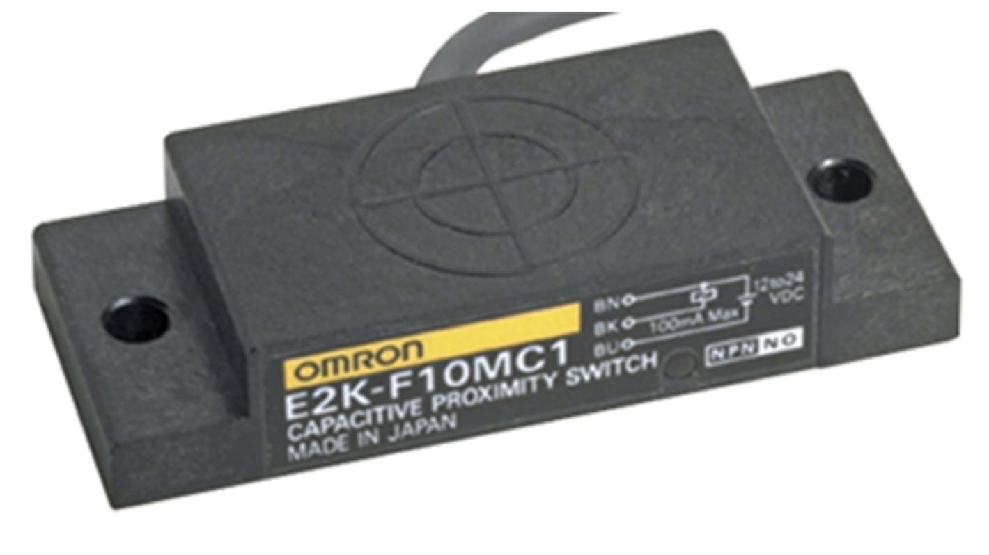 Sensore di prossimità Omron E2K-F10MC2 NPN, induttivo, rilevamento 10 mm, montaggio non a filo, dimensioni 50x20x10.1 mm.