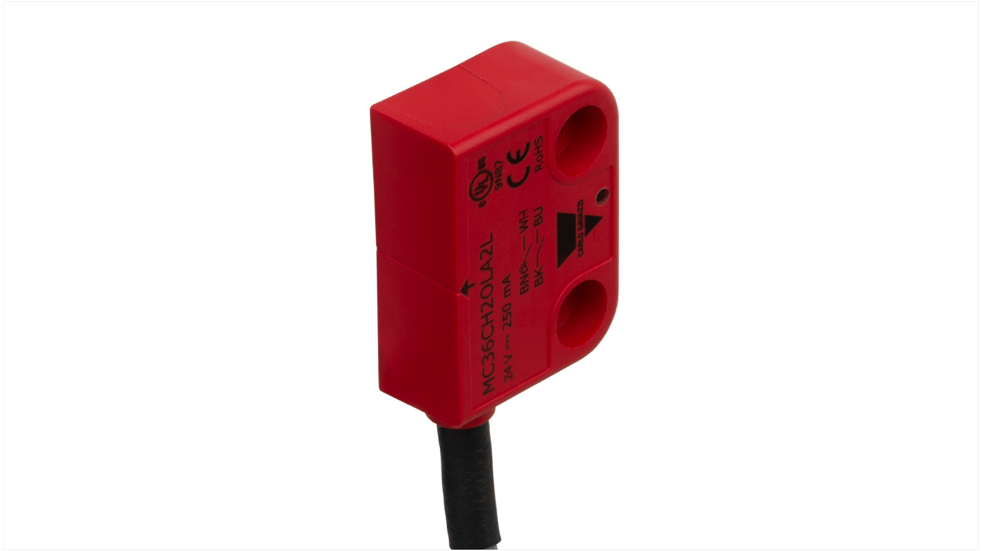 Interruttore di sicurezza Carlo Gavazzi MC36C, contatti NO/NC, alimentazione 12-24V, grado di protezione IP67, dimensioni 37mm x 15mm.